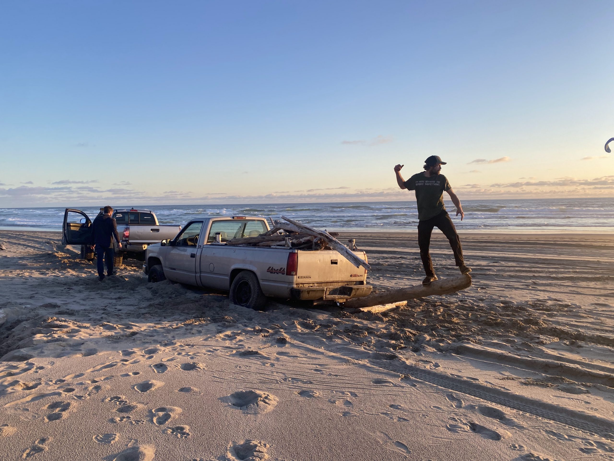 Pacific City locals tow out truck stuck in sand